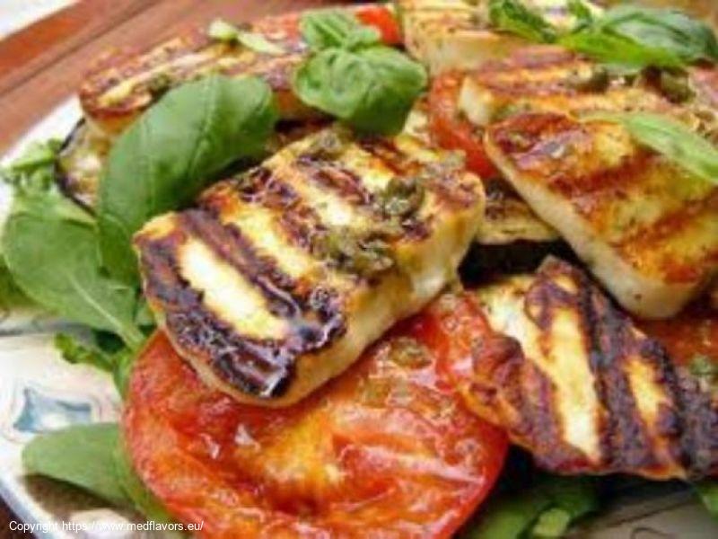 Halloumi with red peppers, capers and olives dressing